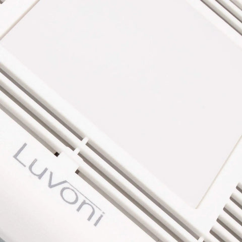 Close-up of Slim 70 CFM Bathroom Exhaust Fan With LED Light 3000K Warm White 600 Lumen, featuring white ceiling grill.