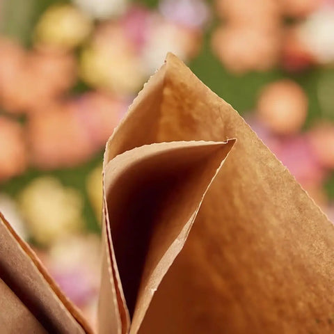 Close-up of 30 Gallon Heavy Duty Brown Paper Lawn And Refuse Bags For Home And Garden, showing the large size and biodegradable material.