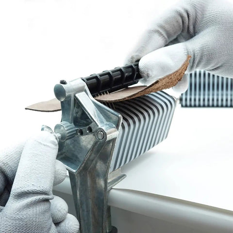 Pro Grade Leather Tabletop Fringe Cutter For Lace Belts And Strips Easy To Use Braiding Cutter Tool With Five Blades Manual Feed Leather Cutter For 3 To 5 Oz Leather being used to cut leather fringe