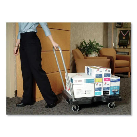 Person transporting boxes with Triple Trolley Heavy Duty Utility Cart, 500 lb capacity, flat-folding design, black finish.