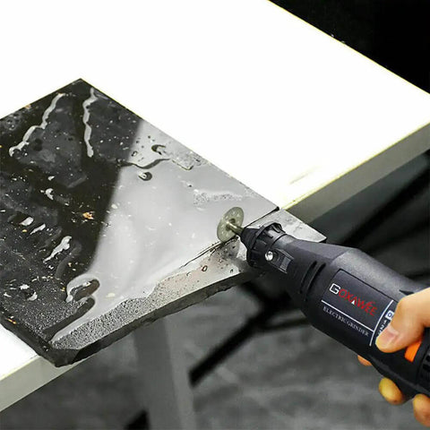 Cutting tile with tool from Pro Grade 30 Piece Cutting Wheel Set With HSS Circular Saw Blades Diamond Cutting Discs Resin Cutting Wheels