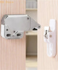Push To Open Cabinet Latch Locking Device 1 Pack For Easy Access, Sturdy Alloy Gate Lock mounted on light wood door