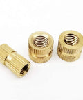 Grab This Solid Brass Metric Insert Nutserts M2 To M10 In Bold Knurl Design, showing three brass nutserts with knurled texture.
