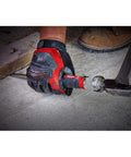 Heavy Duty HVAC Demolition Driver With All Metal Core in action piercing ductwork, held by gloved hand on concrete floor