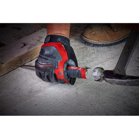 Heavy Duty HVAC Demolition Driver With All Metal Core in action piercing ductwork, held by gloved hand on concrete floor