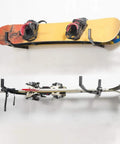 Adjustable Kayak Garage Storage Hooks Wall Mount Set Of 2 Heavy Duty Hangers holding snowboard and skis, foldable design