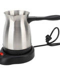 Multifunctional Stainless Steel Turkish Coffee Maker With 600Ml Capacity For Everyday Use And Travel Brew 5 To 6 Cups Fast Like A Pro Electric Turkish Pot With Long Handle Also Makes Tea And Milk Easy Clean, shown in side view on a black base with long handle.