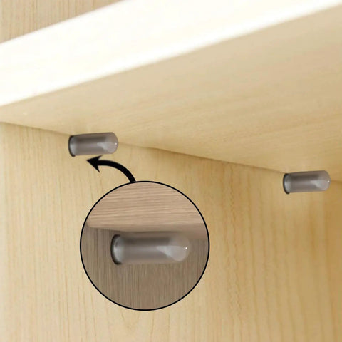 Heavy Duty Twenty Pack Stainless Steel Shelf Support Pegs With Silent Rubber Liners For 5 Mm And Quarter Inch Cutouts visible in wooden cabinet.