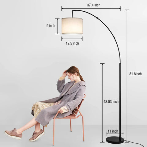 Arc Floor Lamp With Remote Control, 81 Inch Tall Dimmable LED Standing Light, woman seated beneath in living room setting