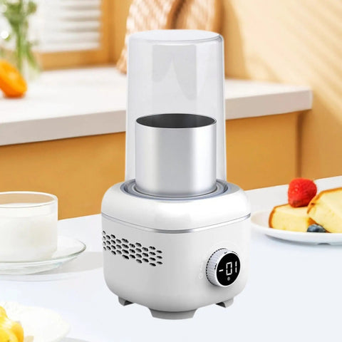 Compact Electric Cup Warmer And Chiller Plate With Digital Temperature Control on a kitchen table, designed for single cups.