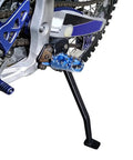 Image of a lightweight aluminum motorcycle kickstand installed on a Yamaha YZ250F YZ450F dirt bike from 2006 to 2009, side view. Lightweight Aluminum Motorcycle Kickstand For YZ250F YZ450F 2006 2009 Dirt Bike Side Stand With Anodized Rust Resistant Finish No Fuss Install For Stable Parking And Long Lasting Durability.