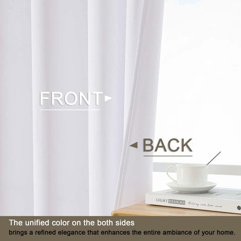 Pure White Thermal Insulated Window Curtains With Silver Grommets, 2 Panels Each 52x84 Inches shown uninstalled on a table