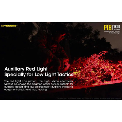 Person using P18 1800 Lumen Compact Flashlight With Auxiliary Red LED Silent Tactical Switch in dark outdoor setting