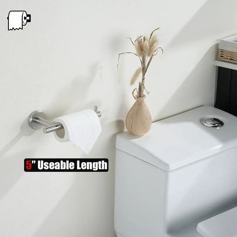 Sturdy 304 Stainless Steel Toilet Paper Holder With 5 Inch Roll Capacity, Brushed Nickel Wall Mount, next to a toilet.