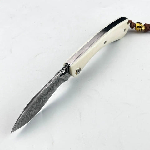 Folding Pocket Knife With 2.99 Inch Damascus Steel Blade And Ivory Synthetic Handle