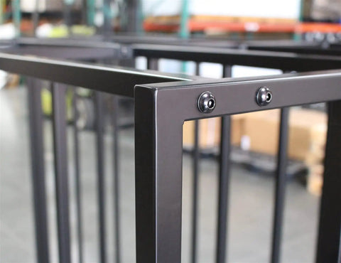 Close-up of metal frame structure showing details of Heavy Duty Vertical Sheet Rack Built To Store Rigid Substrate Panels And Drywall In Your Shop Or Garage Featuring Five Spaced Bays So You Gonna Keep Your Workspace Tight And Completely Stress Free.