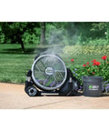 Go To Outdoor Mist Cooling Fan With 18 Inch Blade, 5 Speed Settings, Delivers Up To 5,000 CFM, Two Misting Modes, in garden setting