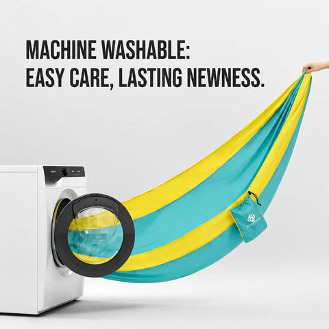 Machine washable Ultra Lightweight Camping Hammock With 500 Lb Capacity And Tree Straps showcased by washing machine.