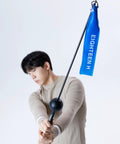 Person using Fast Swing Golf Trainer For Speed And Path Improvement Distance Boost With Lightweight Stick And Latex Band