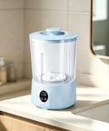 Hassle Free Cordless Mini Washing Machine With Rechargeable Battery And Three Wash Modes on countertop, compact design in blue color.
