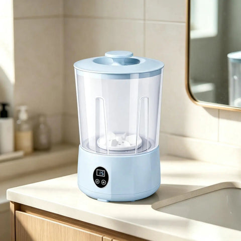 Hassle Free Cordless Mini Washing Machine With Rechargeable Battery And Three Wash Modes on countertop, compact design in blue color.