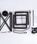 Components of Four Light Wood Grain Black Cage Pendant Lamp for Kitchen Island and Dining Room spread out on surface
