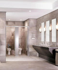Premium Hands Free Touchless Toilet Flush Valve Featuring Self Cleaning Piston And Smart Sensor Setup For Zero Clog Hassle And Heavy Duty Brass Construction in a modern public restroom.