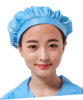 Heavy Duty 12 Pack Breathable Antistatic Mesh Work Caps For Adults And Super Comfy Dustproof Polyester Shop Hats With Quick Dry Panels, blue cap worn by a woman.
