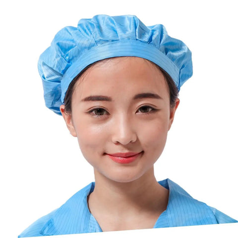 Heavy Duty 12 Pack Breathable Antistatic Mesh Work Caps For Adults And Super Comfy Dustproof Polyester Shop Hats With Quick Dry Panels, blue cap worn by a woman.