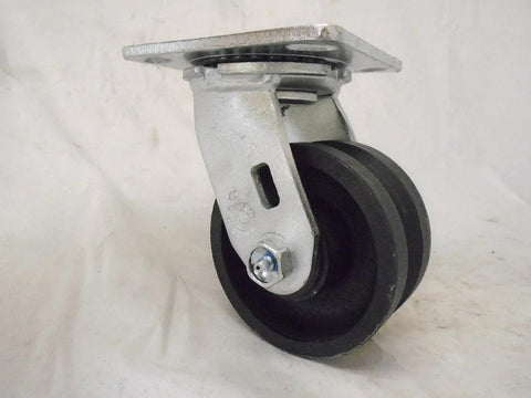 Swivel caster with 4in diameter, 2in wide black V-groove iron/steel wheel on a silver mounting plate