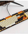 Slick Wired Mechanical Gaming Keyboard With Dope RGB Backlighting And Crisp Blue Clicky Keys Ergonomic Qwerty Design angled view with USB cable