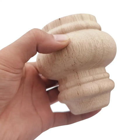 Hand holding 4 Inch Wooden Furniture Legs Unfinished Bun Feet For Sofa Chair Couch Loveseat Ottoman And Dresser Set Of 4