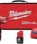Hydraulic Driver With Quarter Inch Hex Two Battery Kit Fluid Drive Powertrain For Quieter Smoother Performance And Durable Torque Longer Run Time Great For Pro Jobs And Tough Projects, shown with charger and contractor bag.