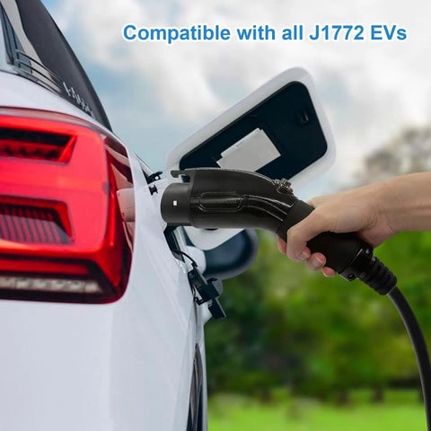 Hand holding the connector of Level Two EV Charger With 240V NEMA 14 To 50 Plug And 25 Foot Cable, compatible with J1772 EVs.