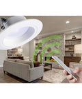 Plug And Play Zigbee Wireless Smart Integrated LED Recessed Downlight Fixture With Tunable Color Temperature 2700K To 4000K White, 5 In and 6 In, installed in modern living room, controlled via smartphone.