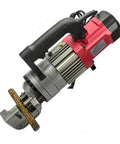 AOXHUBG Electric Hydraulic Rebar Cutter With 900W Copper Core Motor Fast Portable Bending Machine For Construction Crews side view with steel rebar being cut.