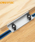 Universal Long Stop Kit For T Track Systems 2-Pack with stop block and wing knobs on wooden table.