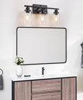 3 Light Black Vanity Light Fixture With Clear Glass Shades For Bathroom Mirror Living Room Bedroom Kitchen Hallway Dope Modern Minimalist Bath Lighting In Matte Black Finish And Farmhouse Vibe mounted above a bathroom mirror