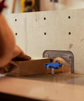 Person using Extra Large Six Flute CNC Spoilboard Surfacing Router Bit With Half Inch Shank Two And Nine Sixteenths Inch Diameter Ten Millimeter Cutting Length Slab Flattening Planer For Woodworking And Milling on wood