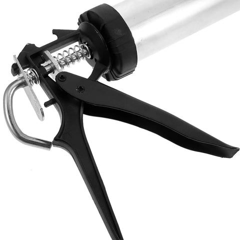 Heavy Duty Metal Caulk Applicator With Thick Steel Rod For Concrete Seams And Tile Grout Lines Smooth Squeeze Sealant Gun close-up of handle.