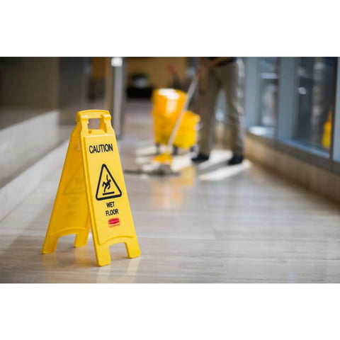 Heavy Duty Real Deal Built Tough Two Sided Caution Wet Floor Sign Stomp Out Slip Hazards In restaurants with a mop.