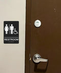 ADA Braille Unisex Restroom Sign 9 By 6 Inches With Self Adhesive Tape For Office And Business Bathrooms Wall Or Door Decor High Contrast White Lettering On Black Background No Fuss Easy Install next to door handle