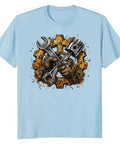 Rugged Garage Project T-Shirt With Vintage Piston Wrench And Gear Badge Design For Hardcore DIY Builds, Engine Repair Work, And Weekend Shop Creations Featuring Distressed Vector Graphics On Mens Heavyweight Cotton, light blue tee with vintage gear and tools graphic.