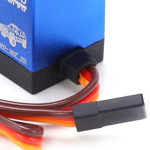 Heavy Duty Digital Servo Delivering Badass 35Kg Torque With Bombproof Metal Gears For 90 Degree Steering On 1/8 And 1/10 Scale RC Cars Trucks And Crawlers Upgraded Build close-up of blue servo with wire connectors.