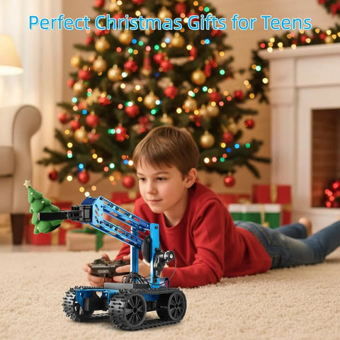 Front view of a blue robotic arm kit on a tracked base being operated by a child with a remote indoors.