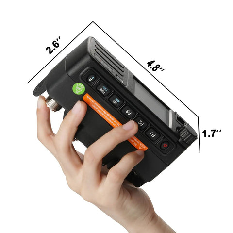 Hand holding compact DB-25D Pro Dual Band DMR Mobile Radio With 20W Output, GPS APRS, UHF VHF, 500K DMR Contacts, dimensions visible