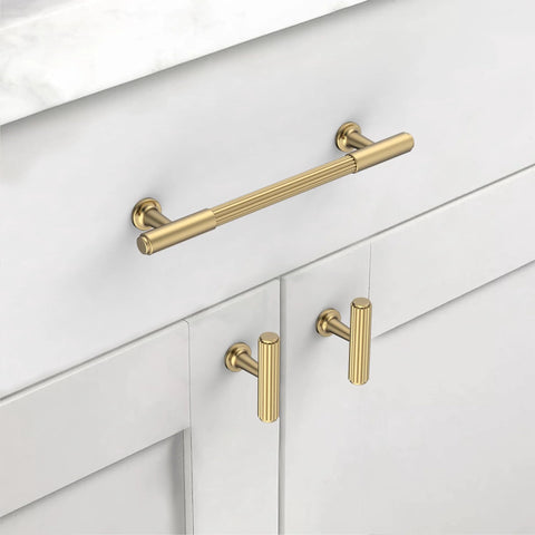 10 Pack Champagne Bronze Cabinet Pulls In 5 Inch 128mm for kitchen cabinets, shown installed on white cupboard.