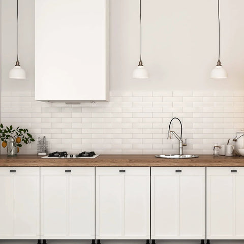 Modern kitchen with 30 Pack 2 Inch Square Cabinet Pulls Matte Black Stainless Steel Kitchen Drawer Pulls on white cabinets.