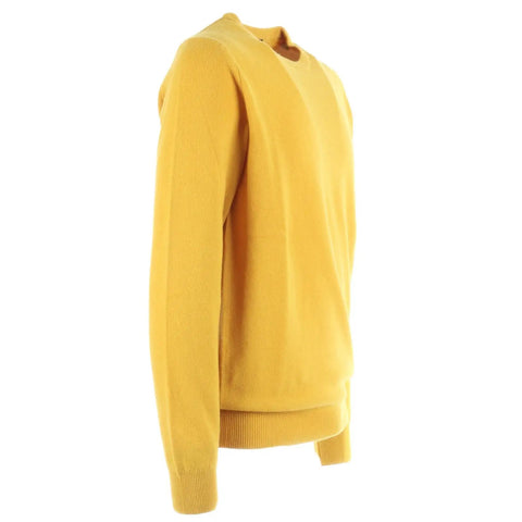 Side view of a yellow long-sleeve sweater with ribbed cuffs and hem, made of soft material.