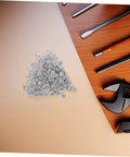 Pile of grey screw cover caps with tools, 500 pack durable plastic thread protectors for cabinets furniture and construction.
